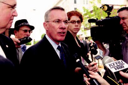 Shaughnessy speaks with reporters following the announcement.