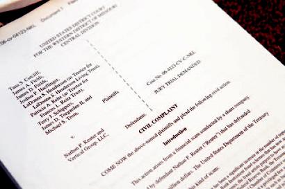 Nine investors filed a lawsuit against local businessman Nathan Reuter, who is being accused of promoting an alleged securities scam. Reuter has filed for bankruptcy.