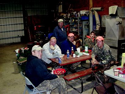 Far right, Nathan Reuter on a hunting trip.
