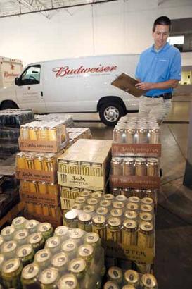 V.P. of Operations Kevin Wisch checks inventory levels for the nonalcoholic products at the N.H. Scheppers warehouse.