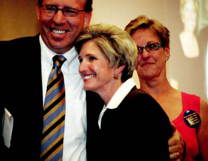 Karen Taylor, center, flanked by Greg Steinhoff and Lynda Baumgartner.