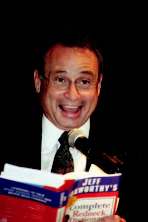 Paul Land, the new Chamber chair, reads from Jeff Foxworthy's Complete Redneck Dictionary during his closing remarks at the 2010 Chamber annual meeting.