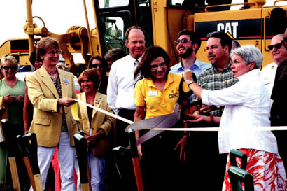 Columbia Public Schools hosted a groundbreaking ceremony for the new school project on July 15. From left: Mayor Bob