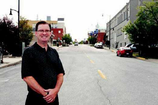 Randy Gray, chairman of Downtown Leadership Council, and futuristic views of Cherry Street from Flat Branch Park to downtown's center