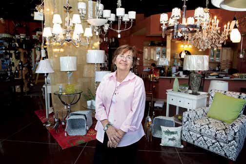 Bright City Lights owner Kay Wax owns one of two businesses in Columbia that sells energy harnessed from rooftop solar panels to the city.