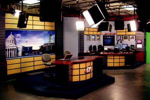 KMIZ's set, before the renovation, had been used for seven years, and the image behind the anchors was a collage of landmarks: the state Capitol, downtown Columbia along Broadway and MU's administration building, Jesse Hall.