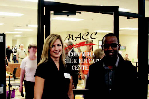 Amy Frey, director of the Columbia campus, and Ben Gakinya, manager of the Parkade Center.