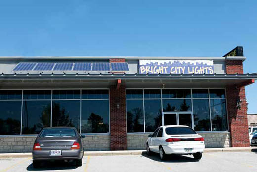 The 48 solar panels on top of Bright City Lights help the city provide renewable energy to customers.