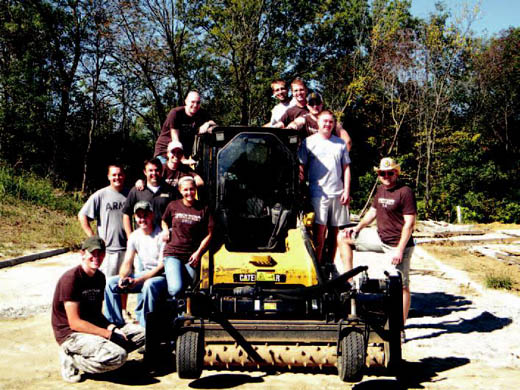 VAMC volunteers gathered for a photo at the construction site.