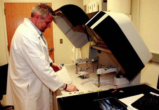 The largest piece of equipment in the lab is an automated clinical chemistry analyzer, which the company leases. Specimen receptacles must be removed and thoroughly cleaned after every use.