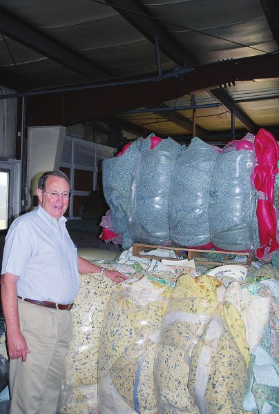 The pictured bales are about 800  pounds a piece, which is around  three to five Dumpsters full.