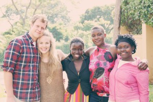 Ben and Liz celebrate with women from the 2013 graduating class in Kampala, Uganda. 