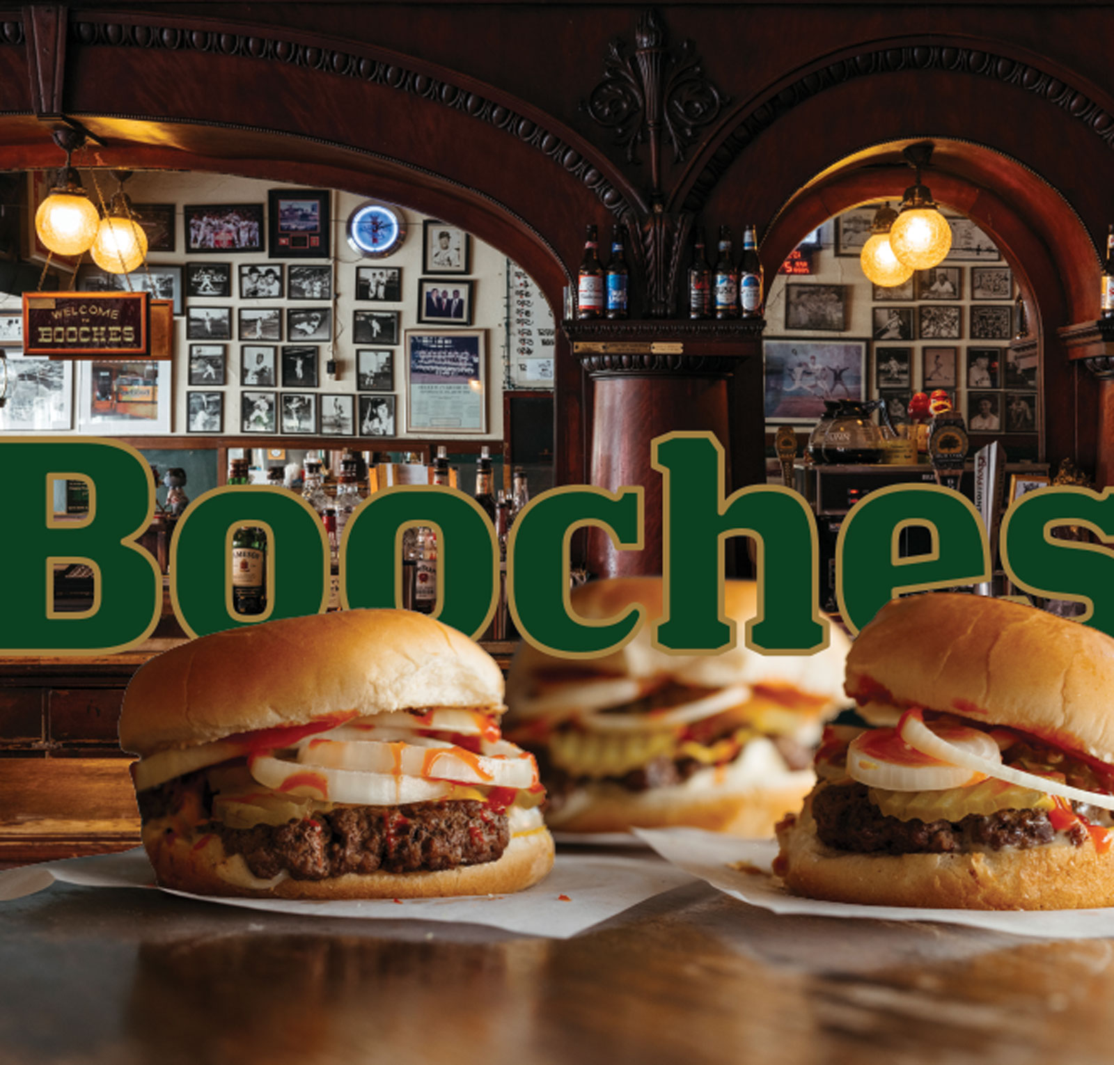 3-Booches-Burgers-Overlaying-the-word-Booches-in-green-text-outlined-in-gold-with-the-Bar-in-the-background