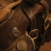 close up of leather detailing on a horse saddle