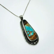 close up of a handmade silver turquoise necklace