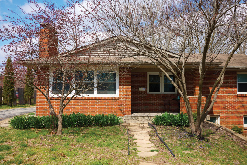 exterior view of front of brick home