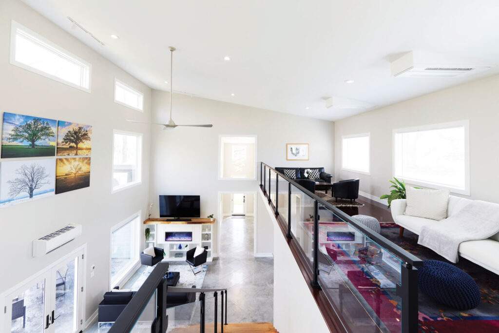 View from the second level overlooking the living room and loft area