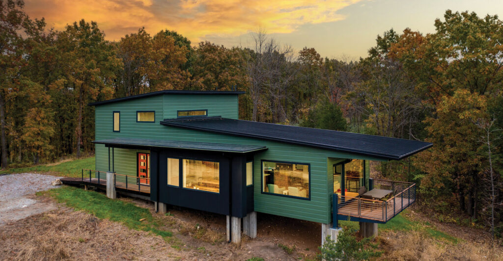 close up of exterior photo of a mid century modern inspired house at sunset