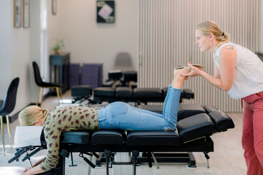 Chiropractic doctor Arminta Phelps treats a patient