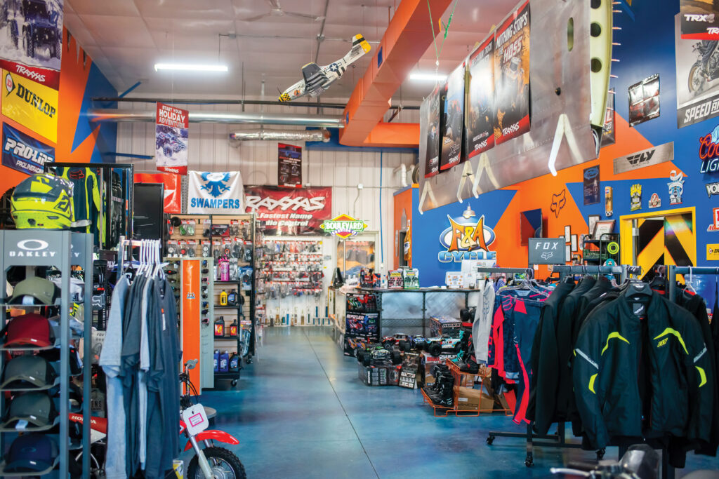 interior of a F and A Cycle garage shop with merchandise on display