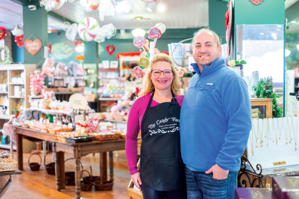 Owners of the Candy Factory, Amy and Mike Atkinson stand inside their shop