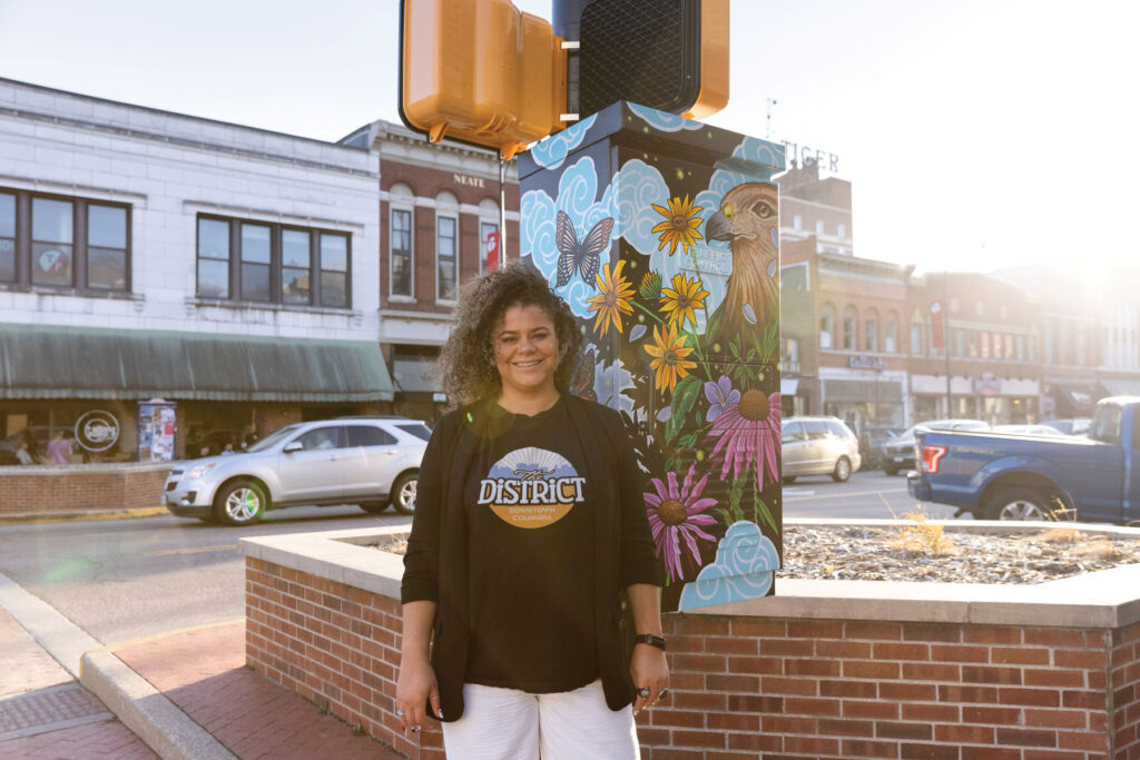 Nickie Davis in The District standing in downtown Columbia, Missouri