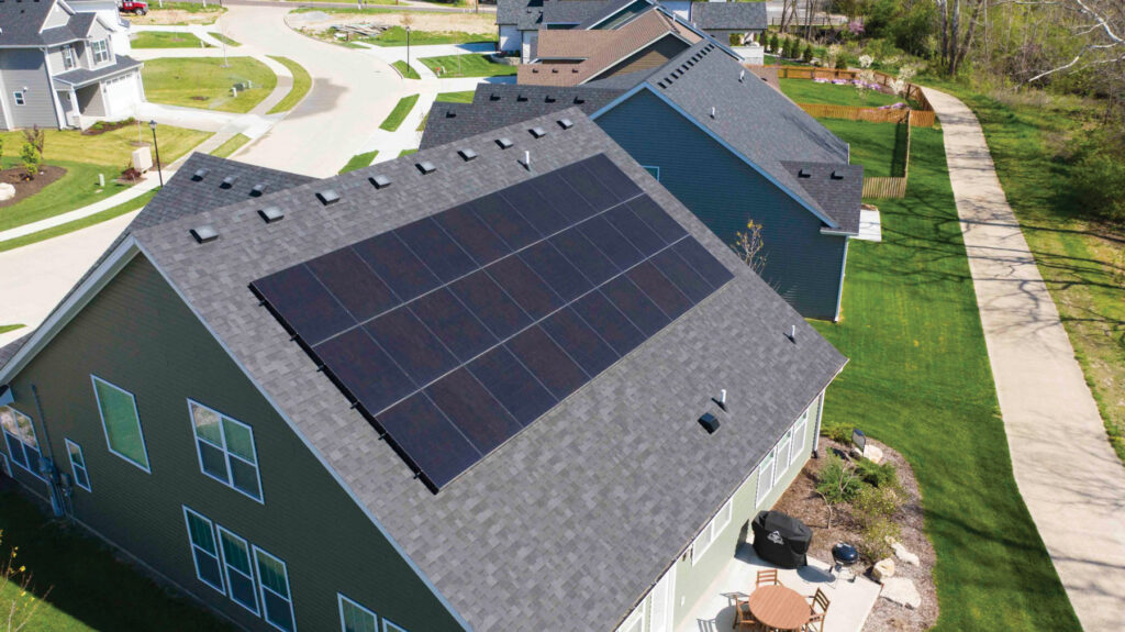 exterior of a residential houses with solar panels installed on the roof