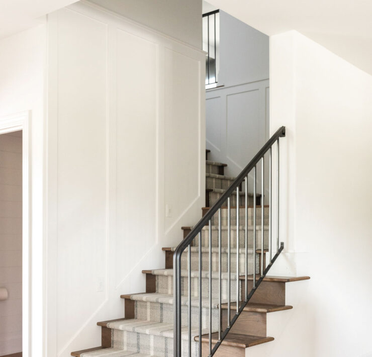 Stairs With Metal Railing And Runner