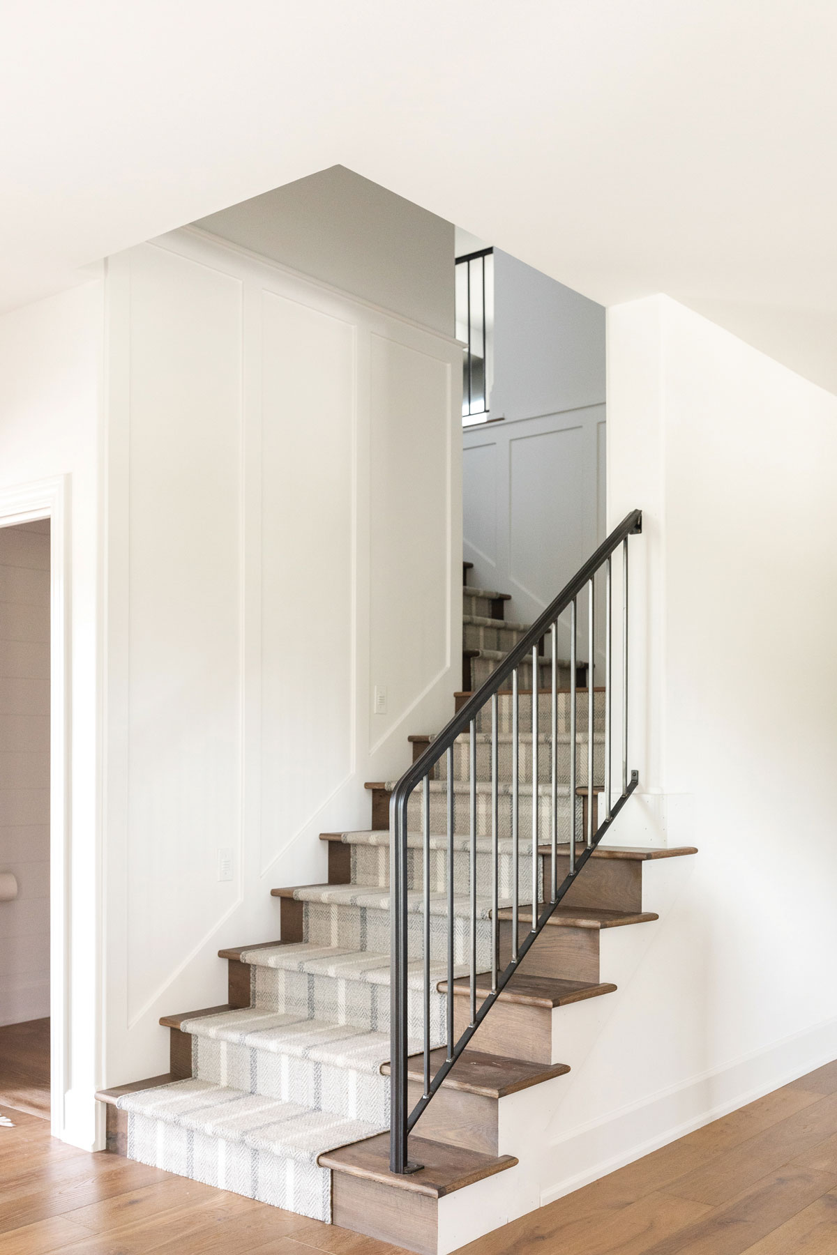 Stairs With Metal Railing And Runner