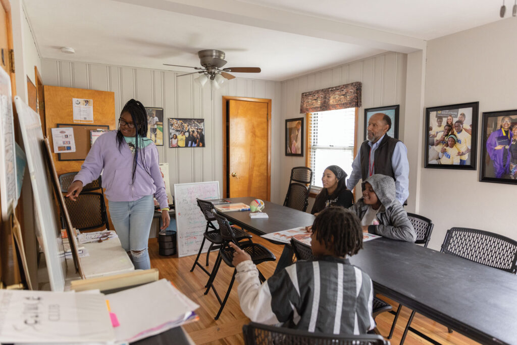 Dr Ellis Ingram With Students Of Caleb