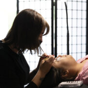 Miranda Fuhr applying Alana Harper Lashes on client