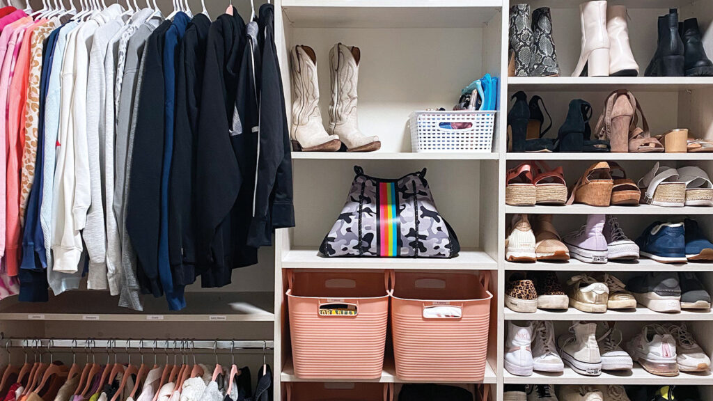 Organized Closet filled with shoes and clothes