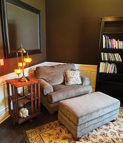 Staged Overstuffed Arm Chair and Ottoman