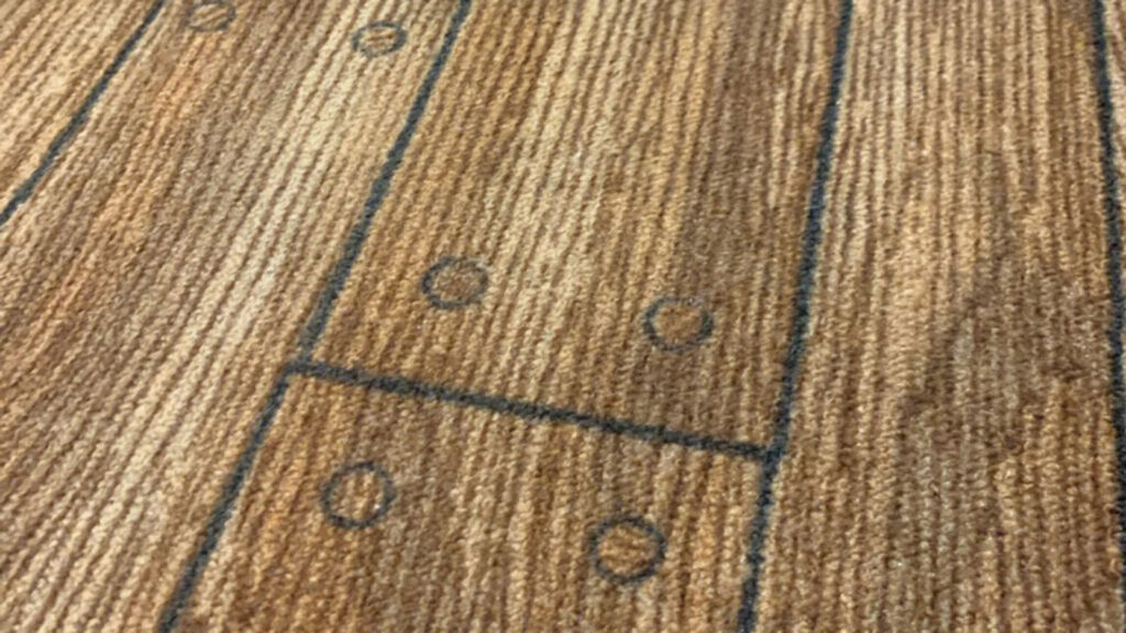 close up of Wooden Carpet Feat