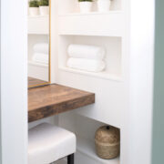 Built in plaster storage solution in vanity area