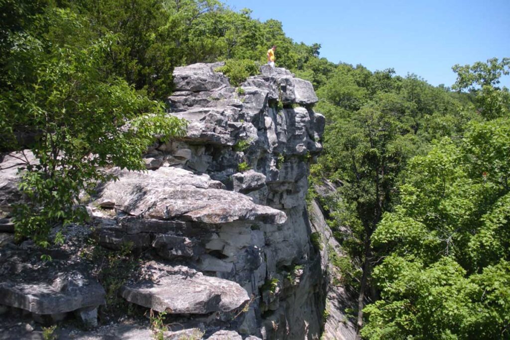 man standing at the edge of Capen Cliff