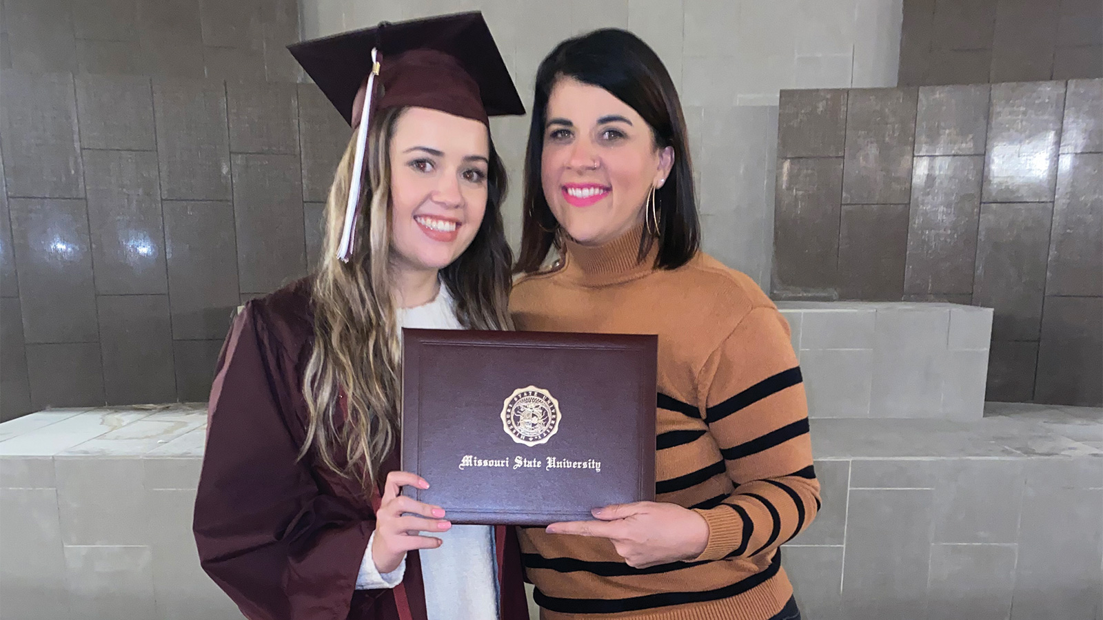 Kim and her daughter on graduation day from Missouri State University