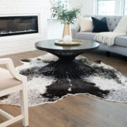 Living room coffee table on a cowhide rug