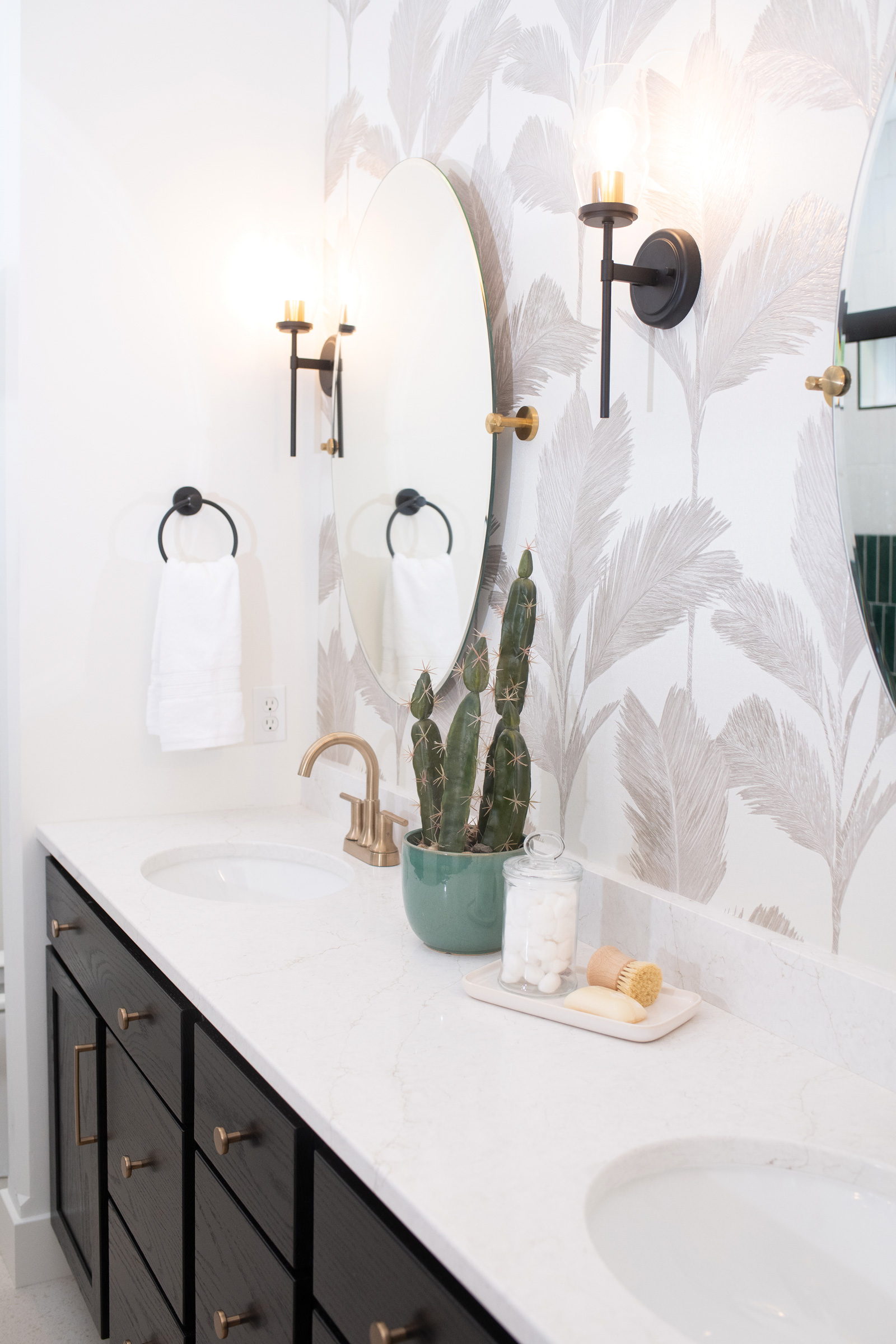 Modern bathroom vanity with botanical wallpaper
