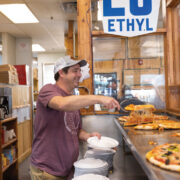 Toby Epstein Serving Pizza