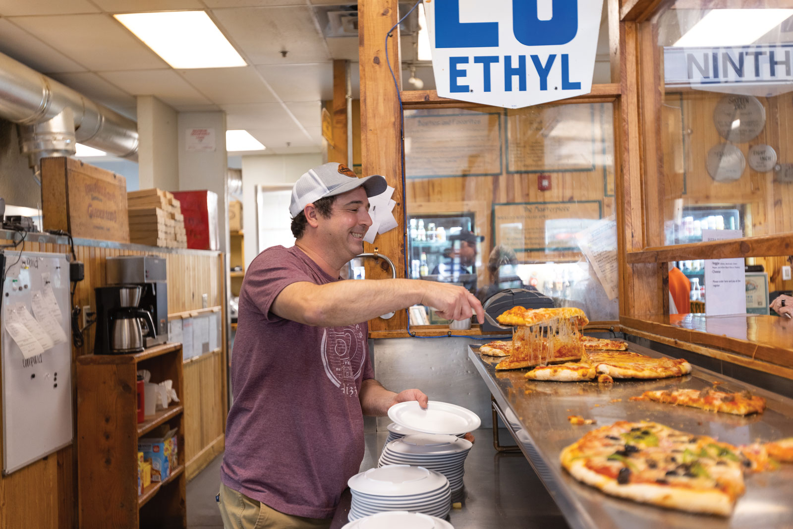 Toby Epstein Serving Pizza
