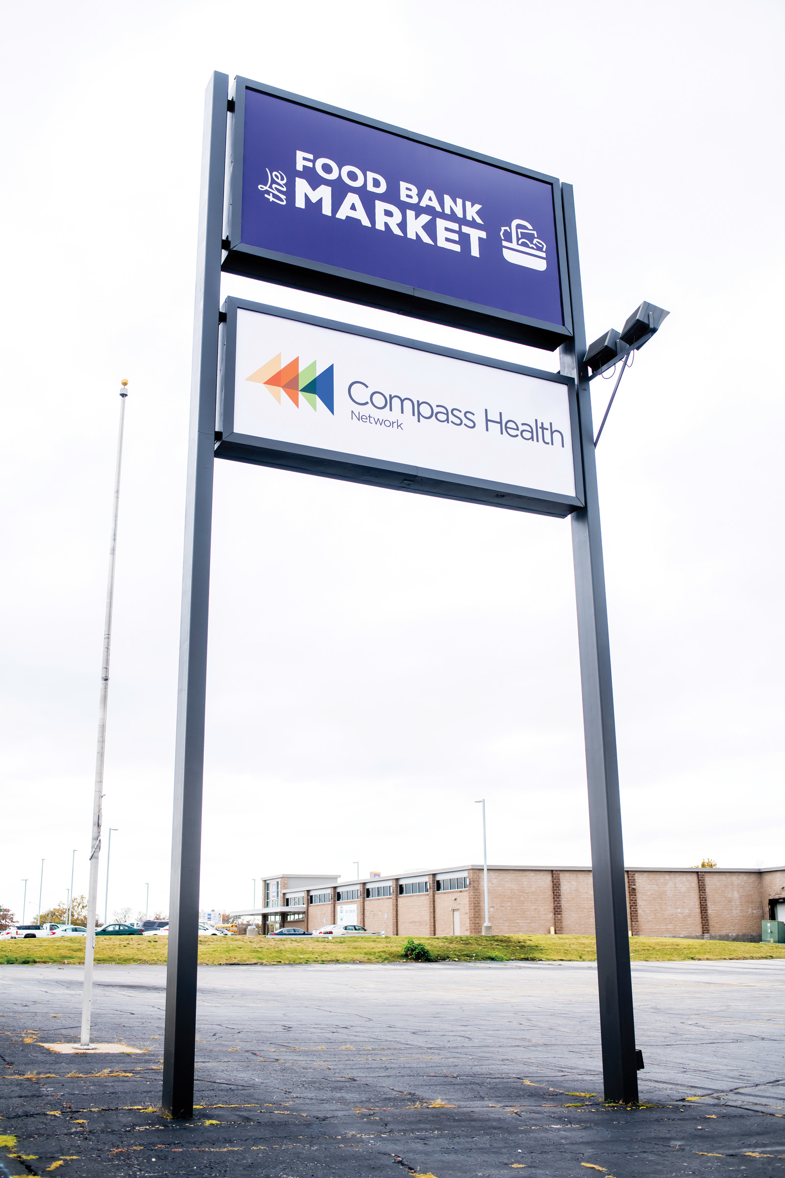 The Food Bank Market and Compass Health exterior signage
