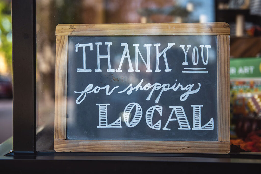 thank you sign in local store window Tim Mossholder Qvwngmotbik Unsplash