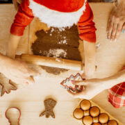 A family prepares to bake Christmas treats together. Getty Images.