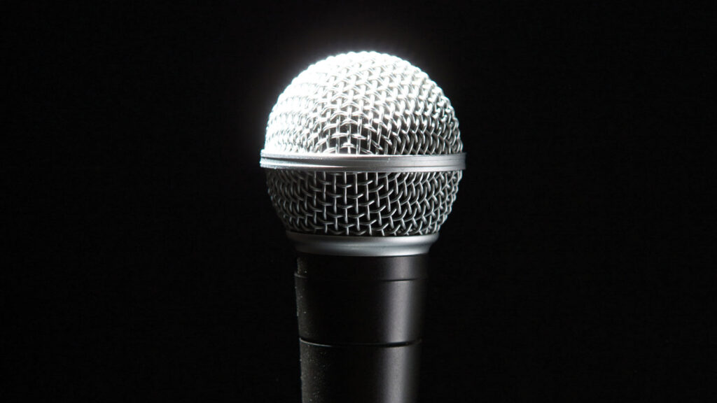 Microphone on black background