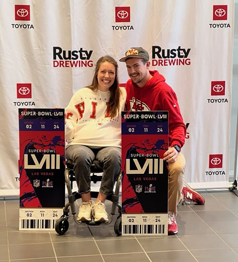 Kathleen and Kyle McDonald with their Super Bowl gift package at Rusty Drewing Toyota in Jefferson City.