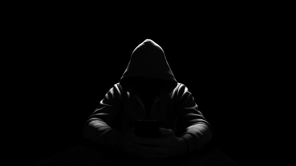 Sextortion: Dark Hooded Figure