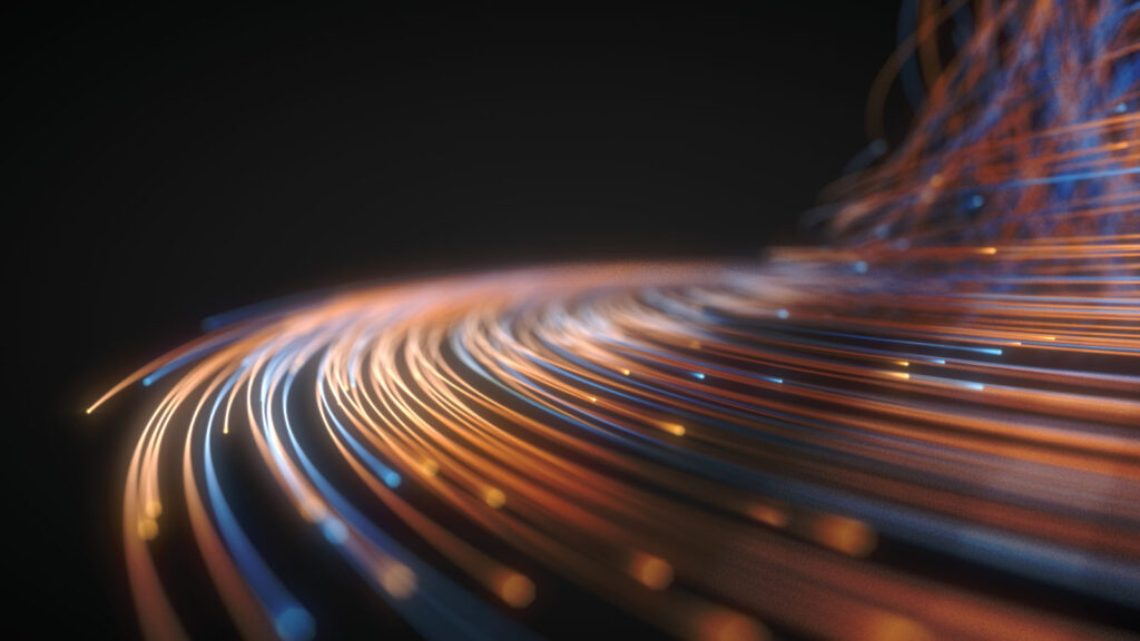 Glowing fiber optic strings on a black background.