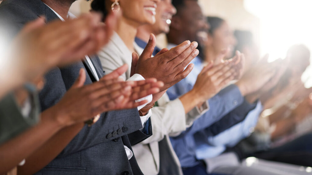 Cropped Shot of an Unrecognizable Diverse Group of Businesspeople Applauding