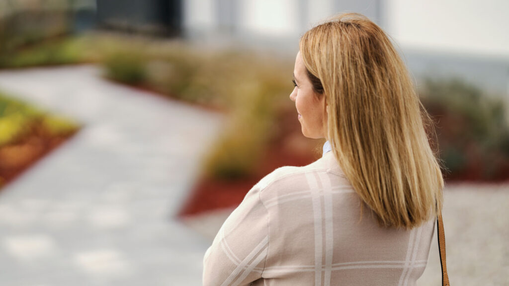 Woman Looking Down a Zig Zag Path